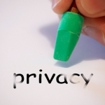 hand erasing the word privacy